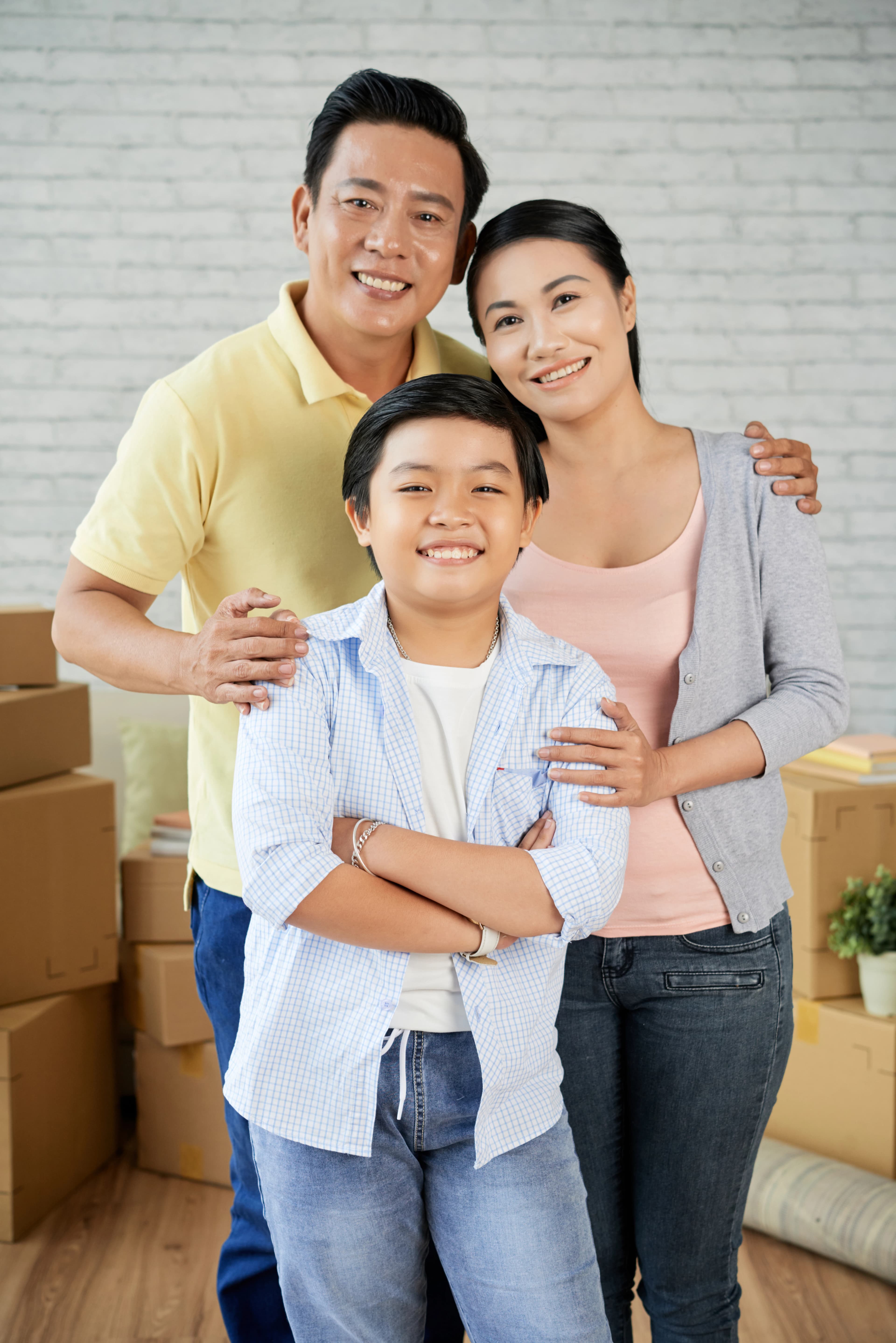 Asian family moving to a new home together